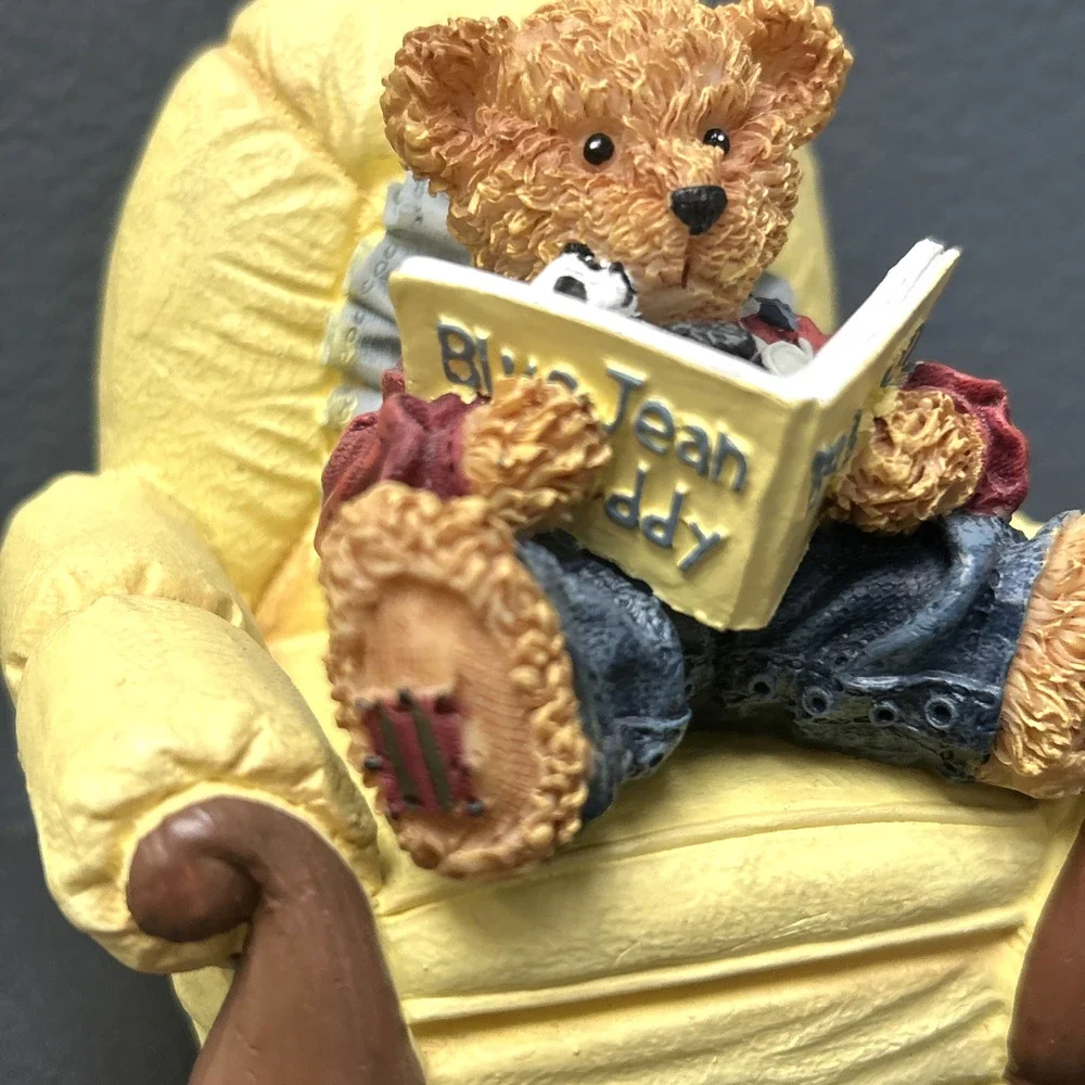 Baby Bear Sitting In Yellow Chair Reading Book With Stuffed Animal Toy Figurine
